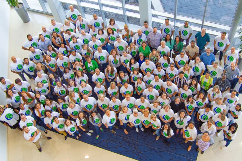 Crane Worldwide Logistics employees gathered for a company team photo
